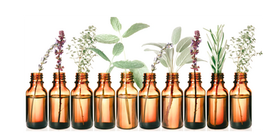 amber bottles in a line with herbs inside