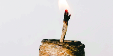 hemp wick bundle lit with flame