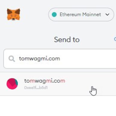 MetaMask screenshot showing tomwagmi.com points to an ethereum wallet