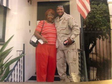 Pictured with my mother before being deployed to Iraq