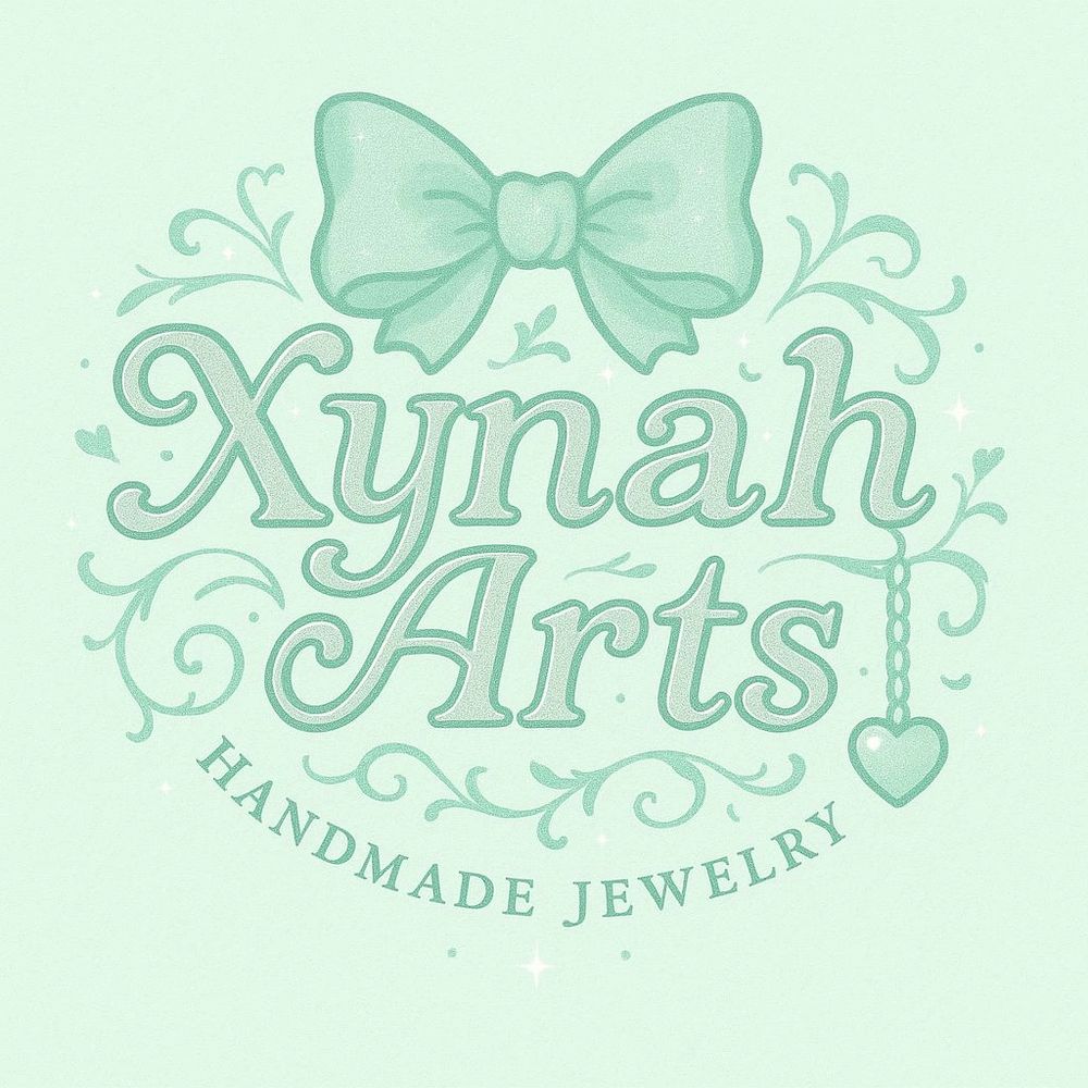 Elegant logo for Xynah Arts Handmade Jewelry with bow and heart charm.