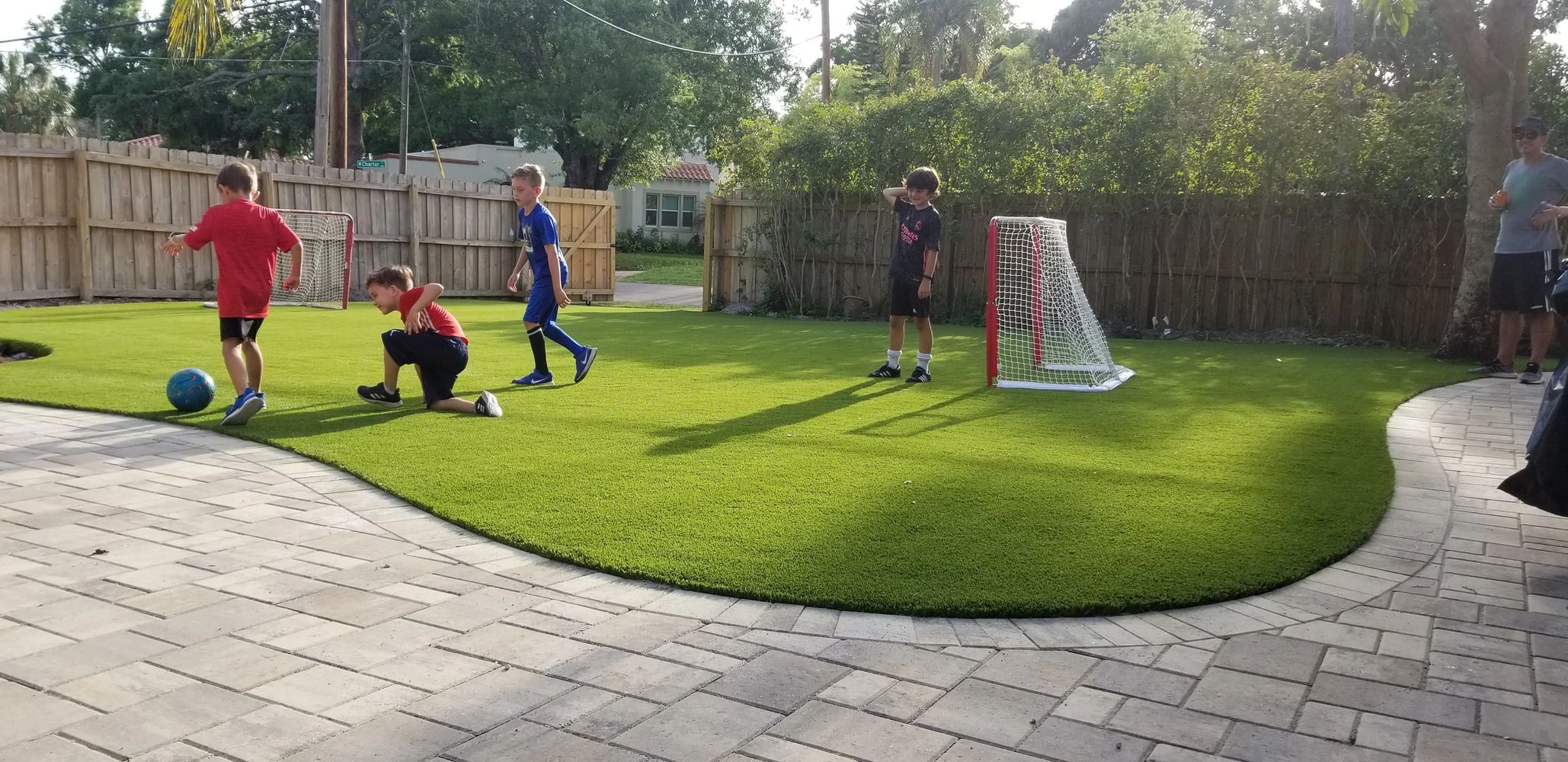 Artificial Grass is great for kids and pets and it looks great too.