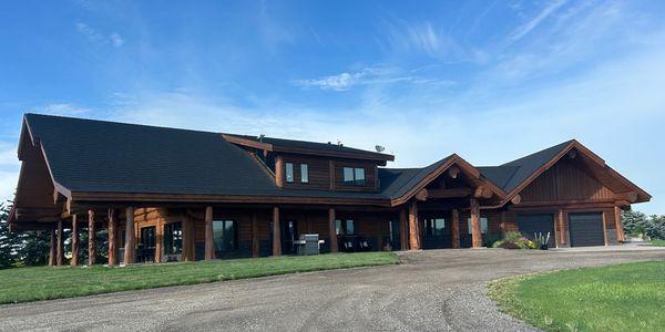 Log home finished with a fresh coat of stain