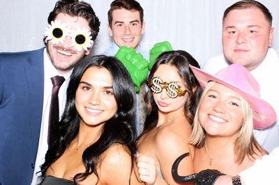 Party guests having fun in a Sarasota photo booth