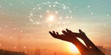 pair of hands holding a brain in the light