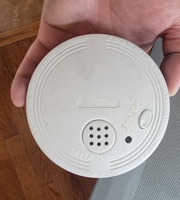 Replacement smoke detector prepared for installation in a Westside Albuquerque home.