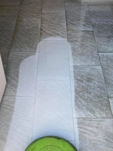 Floor cleaning tile and grout.