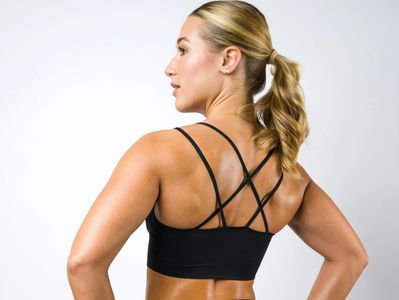 The woman is light-skinned with shoulder-length blonde hair pulled back in a ponytail. Lymphatic Drainage Massage Mequon Milwaukee.