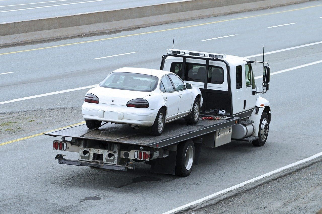 Flat bed towing