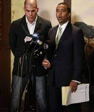 Reporters interviewing a man