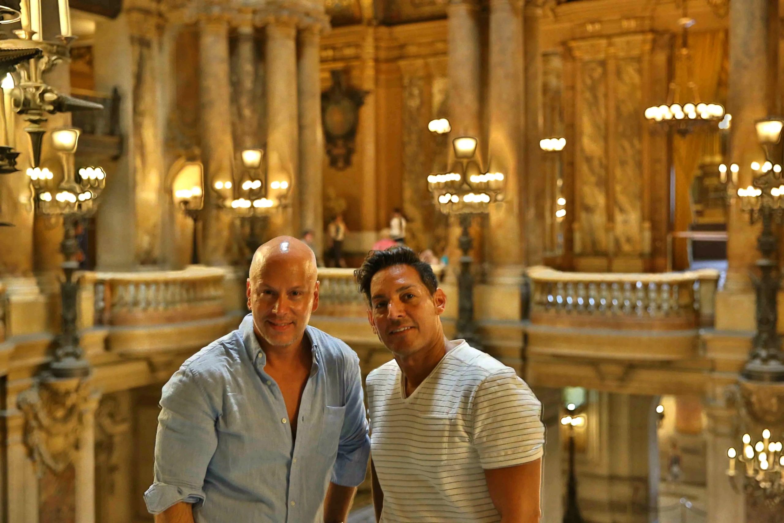 David and Steven smiling for the camera in a welcoming manner