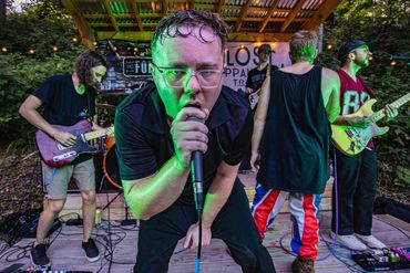 A band rocks out at a reception.