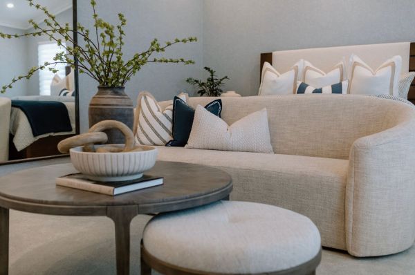 Bedroom sofa with wood coffee table and ottoman stool