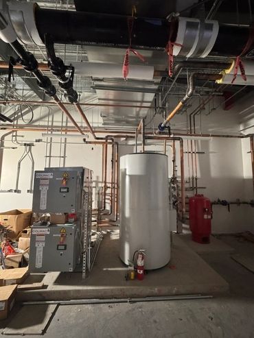 Water heaters w/ storage tank and expansion tank applied in a commercial aspect.