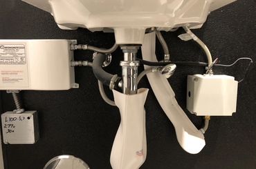 Commercial bathroom finish with instahot installed.