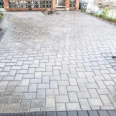 Backyard paving stone installation by AQ Construction, in the Bronx and Nassau County.