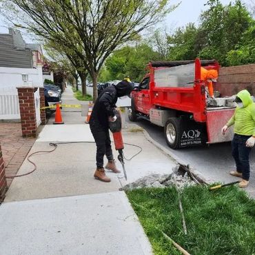 Professional sidewalk violation repair & removal services, by AQ Construction in the Bronx and NYC.