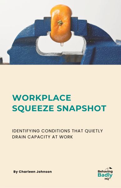 Workplace squeeze concept with orange in a vise.