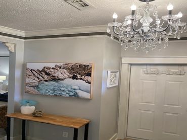 Panama City rental home foyer. Beach pictures, beach decor.