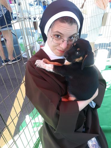 Puppy snuggles at the H.O.P.E. Safehouse Puppy Shower!