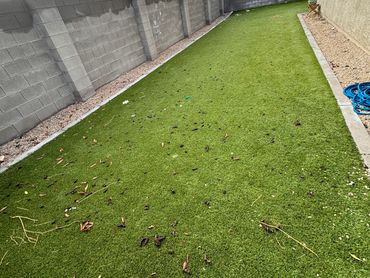 Matted and dusty artificial turf in Queen Creek before professional cleaning and power brushing.