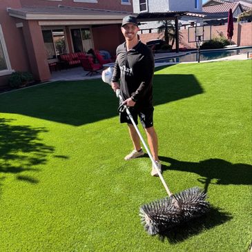 Professional power brushing to re-bloom matted artificial grass in Queen Creek.