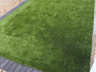 Cleaned and sanitized artificial grass in San Tan Valley after odor elimination treatment