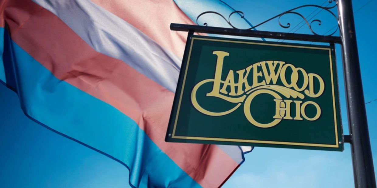 Signboard of Lakewood, Ohio with a background flag.