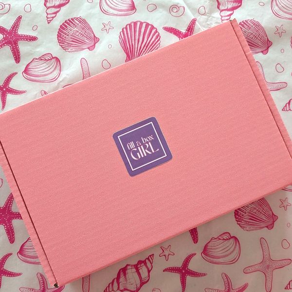 Fill a Box Girl Pink Box on the Table. Self Care Wellness Box.