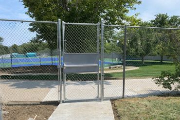 Chain link fence and gate installation at a Colorado public park by Contract Equipment Operators