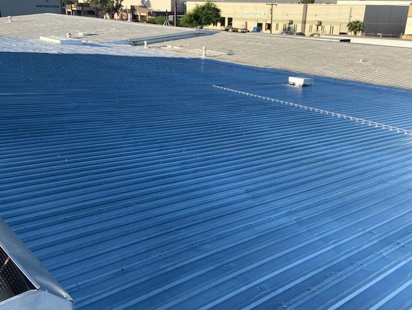 New roof section ready to be coated and waterproofed with a new roof coating