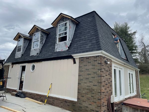 New shingles installed on a roof.