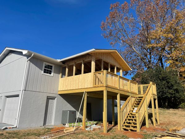 Custom deck addition amid construction.