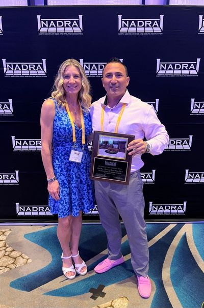 "Jon Benaglio accepting the NADRA National Deck Award for Deckmasters of Florida"