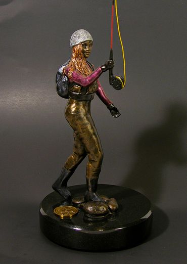 Woman Fly Fishing Sculpture