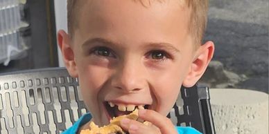 Boy enjoying Food Truck panini