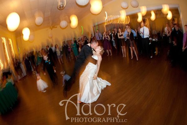One of my couples dancing their first dance. Groom is dipping and kissing his lovely bride.