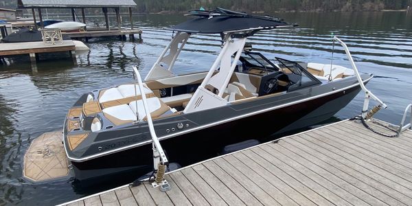 Boat docked on long lake