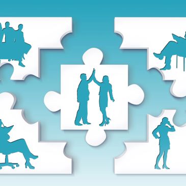 Puzzle pieces with silhouettes of people in different professional postures.