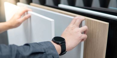 Symbolic photo representing a Kitchen design company. Hands on kitchen cabinet options.