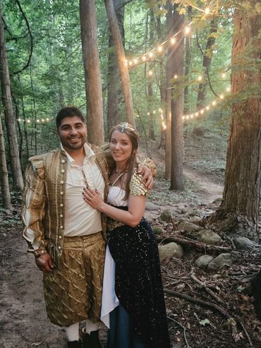 Medieval couple in forest of lights in Northern MI