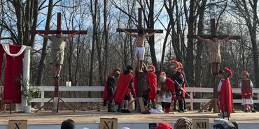 Crucifixion reenactment - Jesus and thieves hanging on three crosses