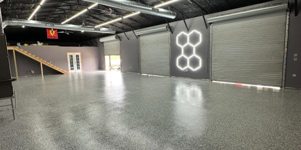 Empty modern industrial space with hexagonal lights.
