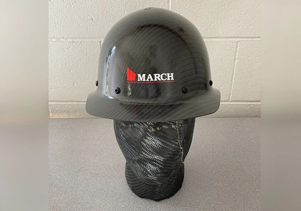 A hard hat with a text March written on it