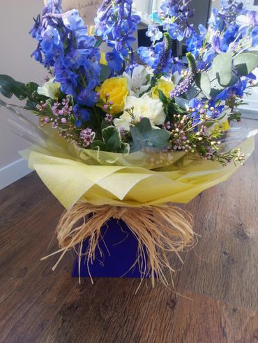 A gift bouquet in a presentation box.