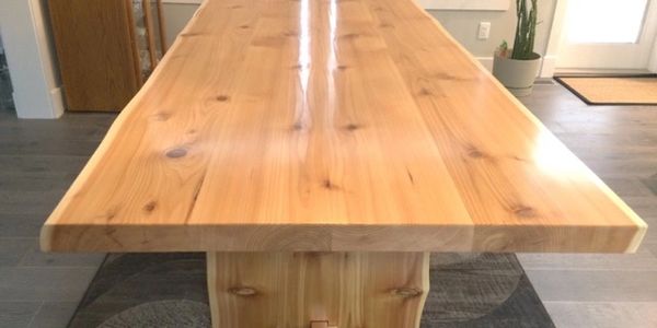 Live edge dining table made in Tofino, bc, Canada.