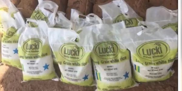 Bags of Lucki long grain white rice.