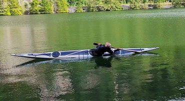 Capsizing for the reverse sweep roll.