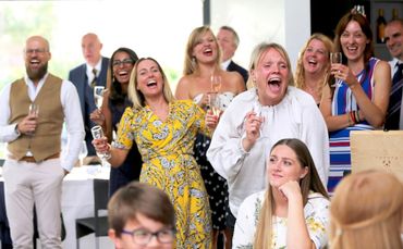 wedding crowd all laughing