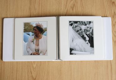 open wedding album on desk
